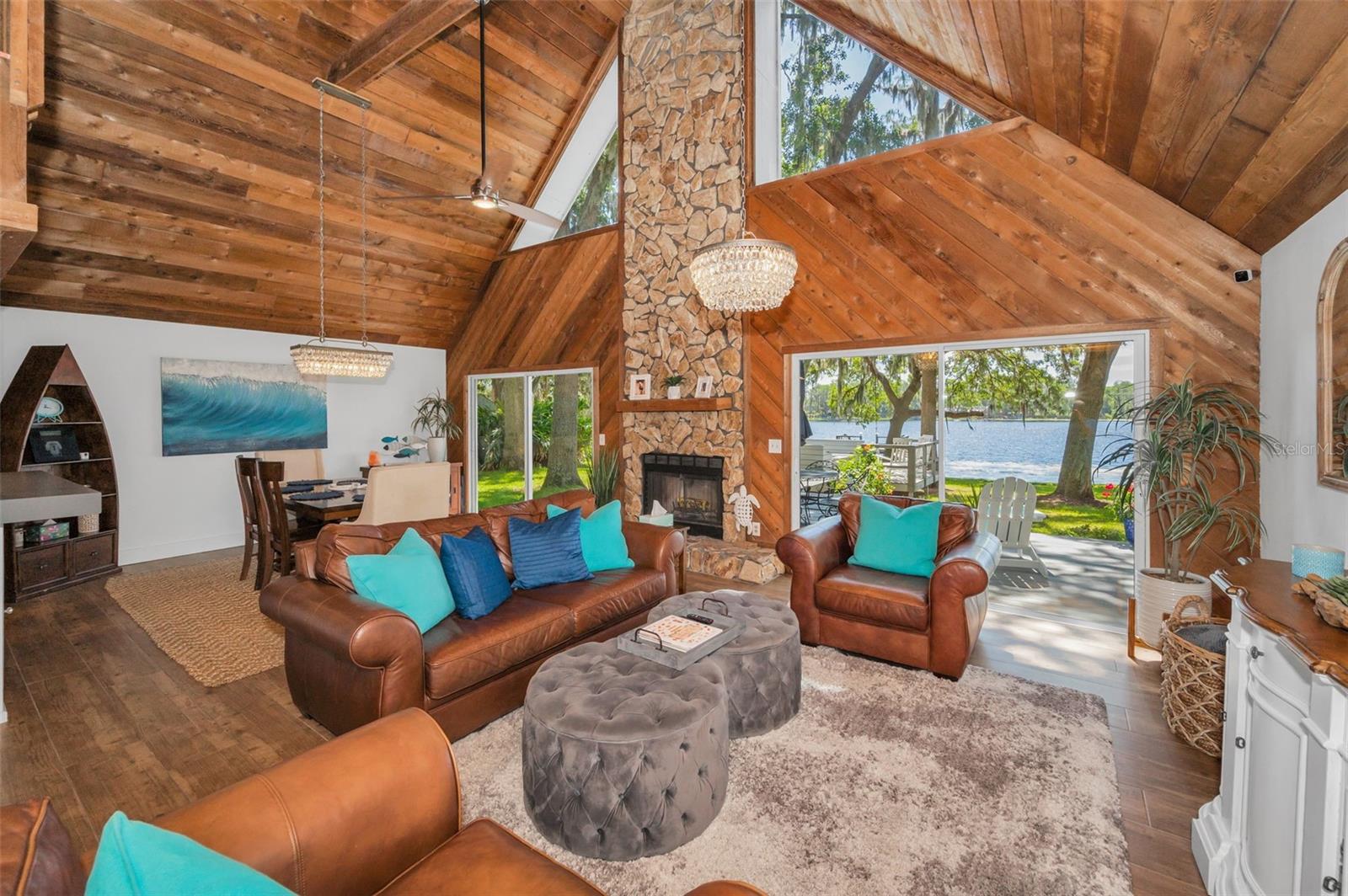 Living Room with Open Concept Living and Soaring Ceilings.