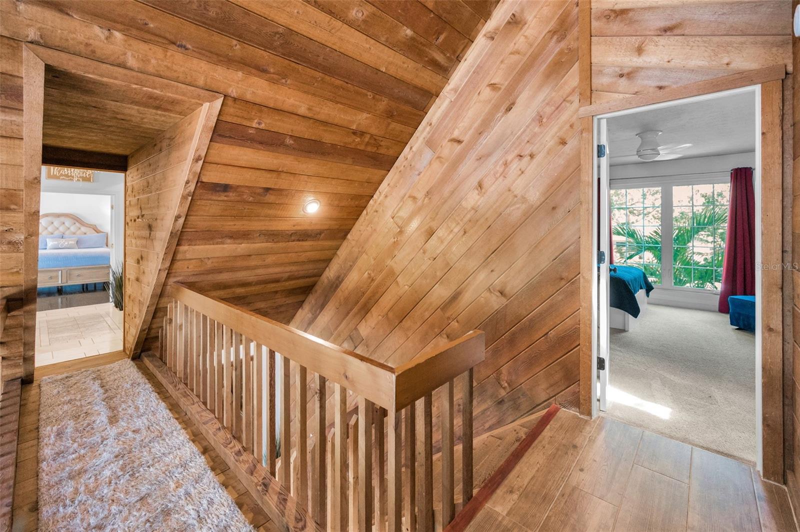 Primary Suite to the Left and Bedroom 3 to the Right.