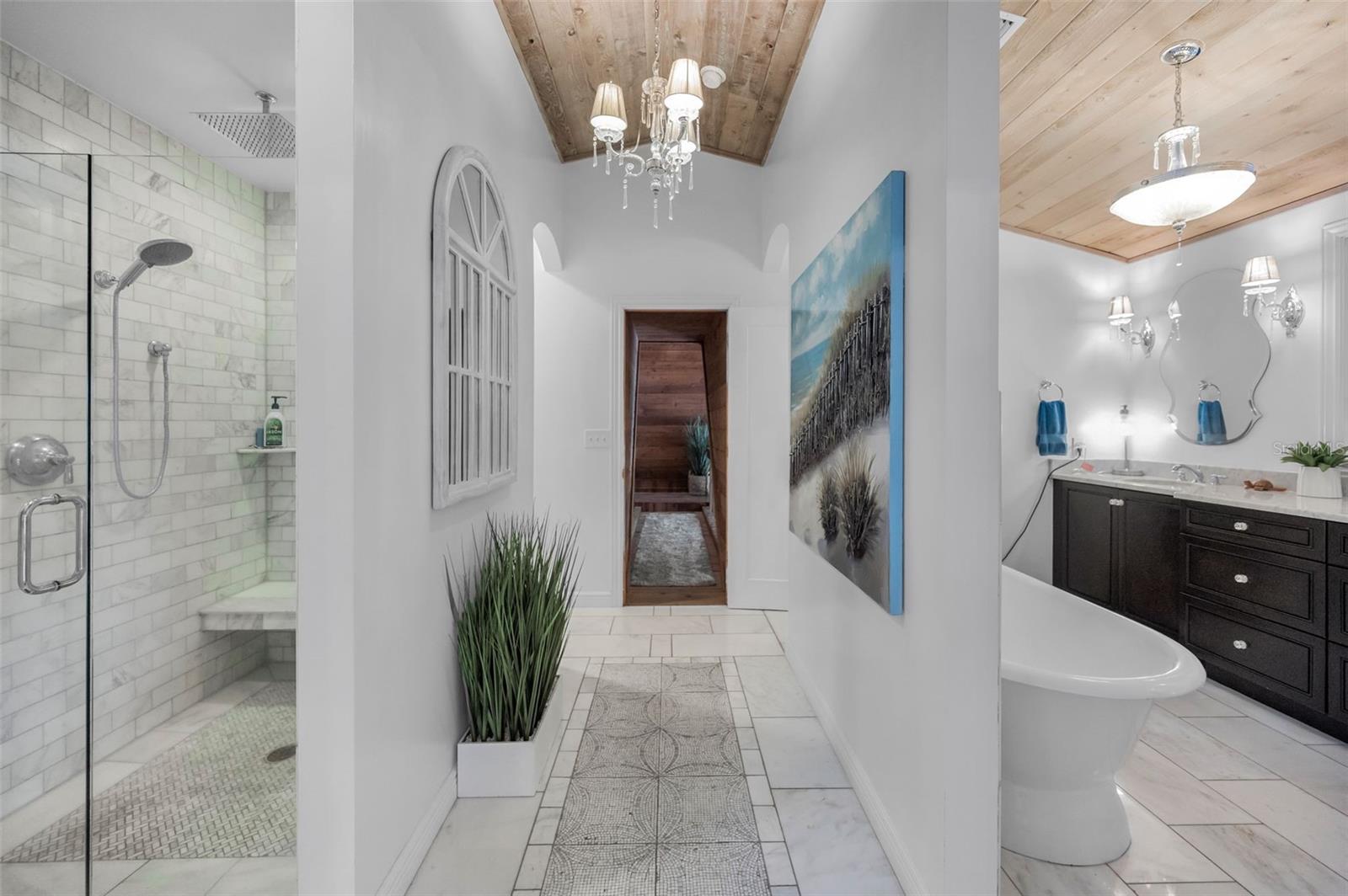 Primary Ensuite Bathroom Featuring Marble Finishes