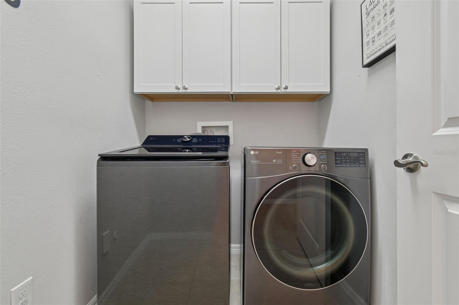 Laundry room- cabinets added! (Washer and Dryer do not convey)