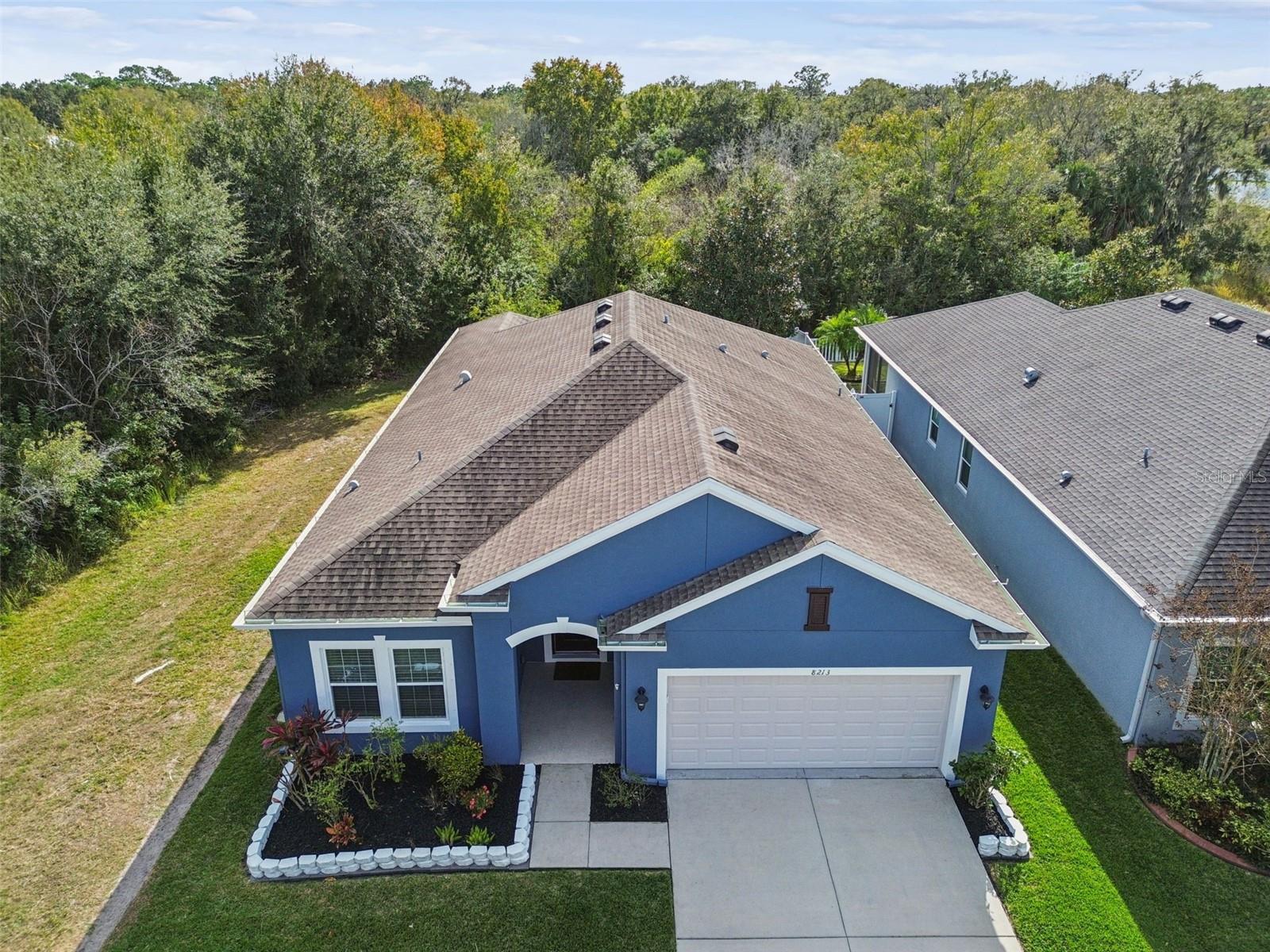 Trees to the sides and rear