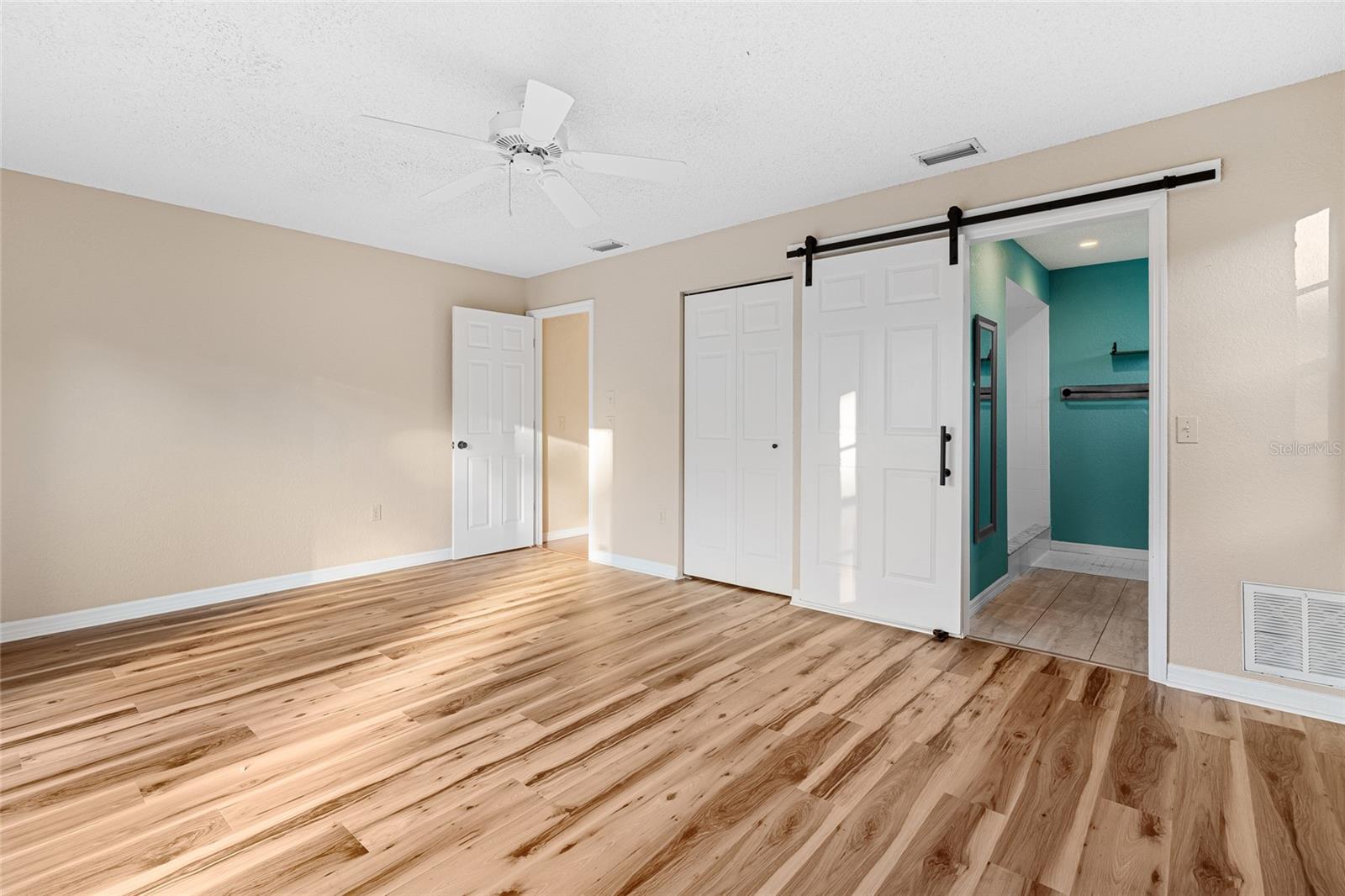 Master bedroom looking towards master bathroom
