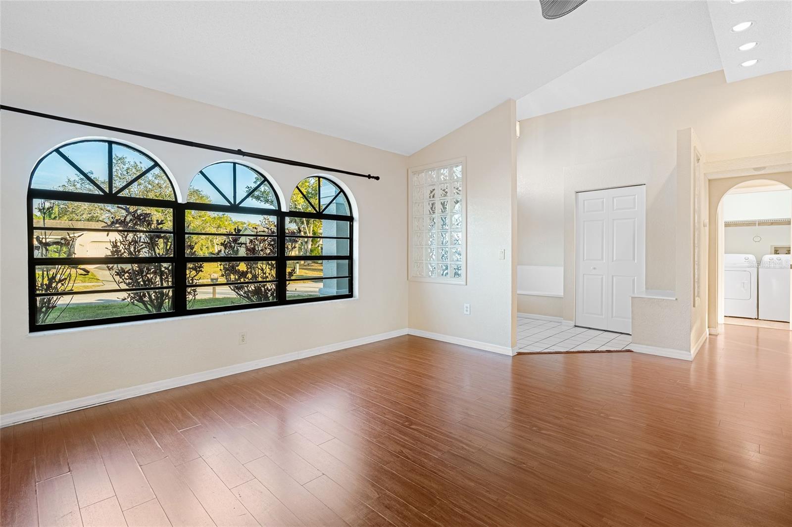 living room/dining room looking towards entry
