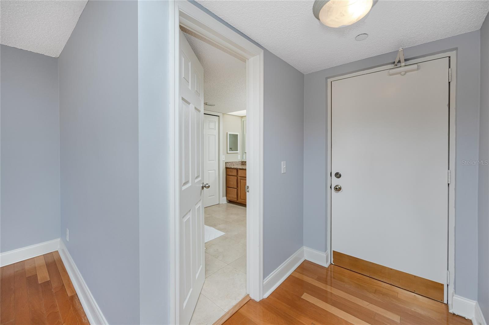 Full guest bathroom near the entrance