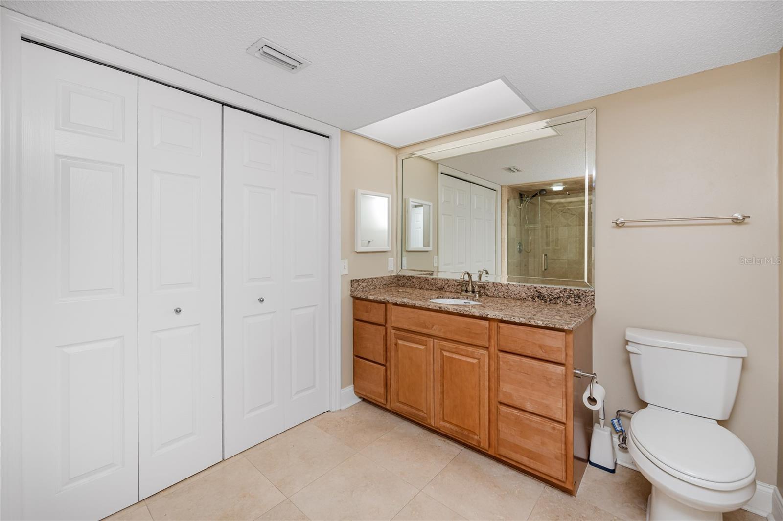 Full guest bath with washer and dryer in the closet. Brand new water heater in closet as well! (Dec, 2025)