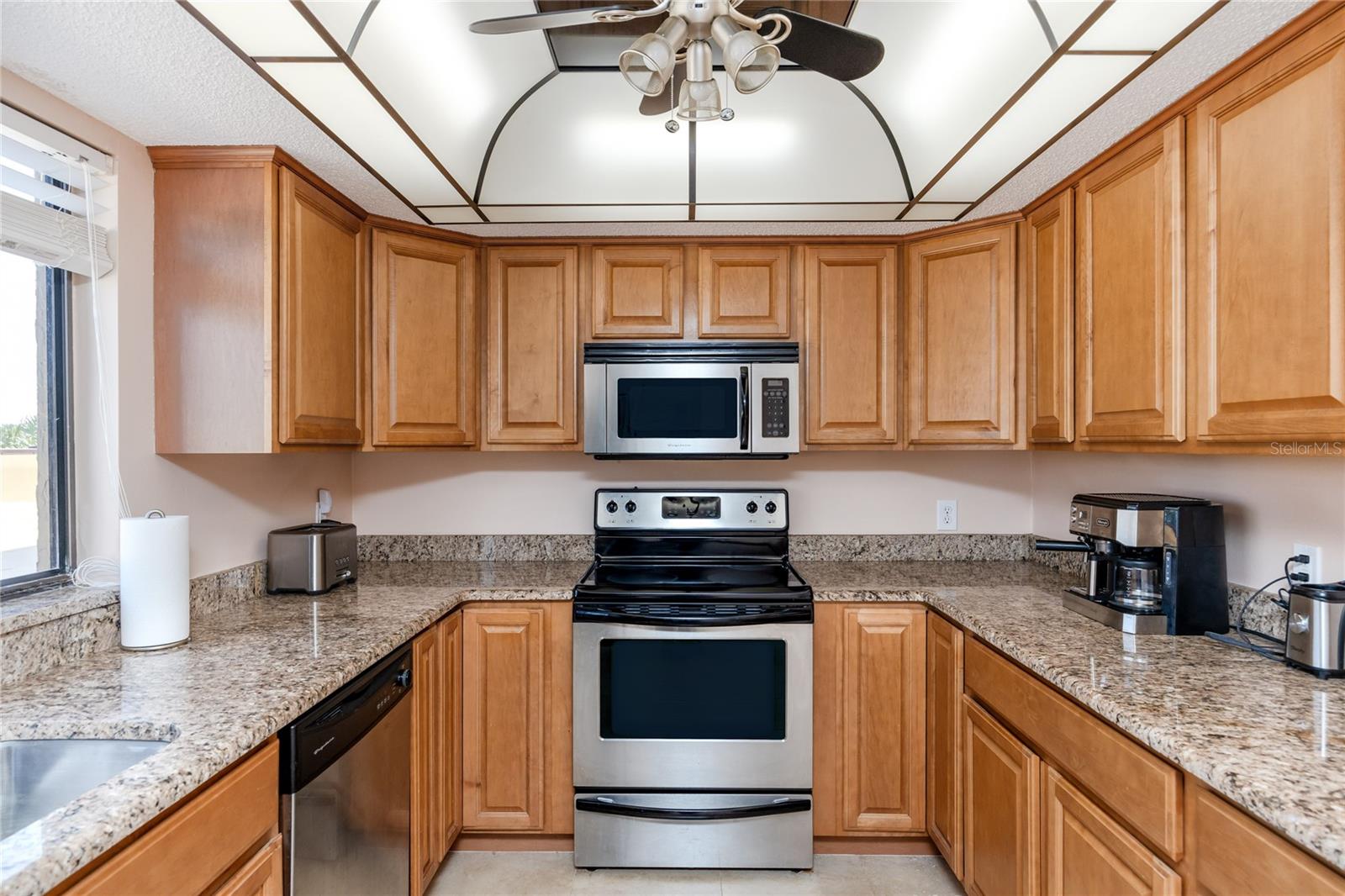 Nice updated kitchen with granite countertops and window that allows lots of natural light.