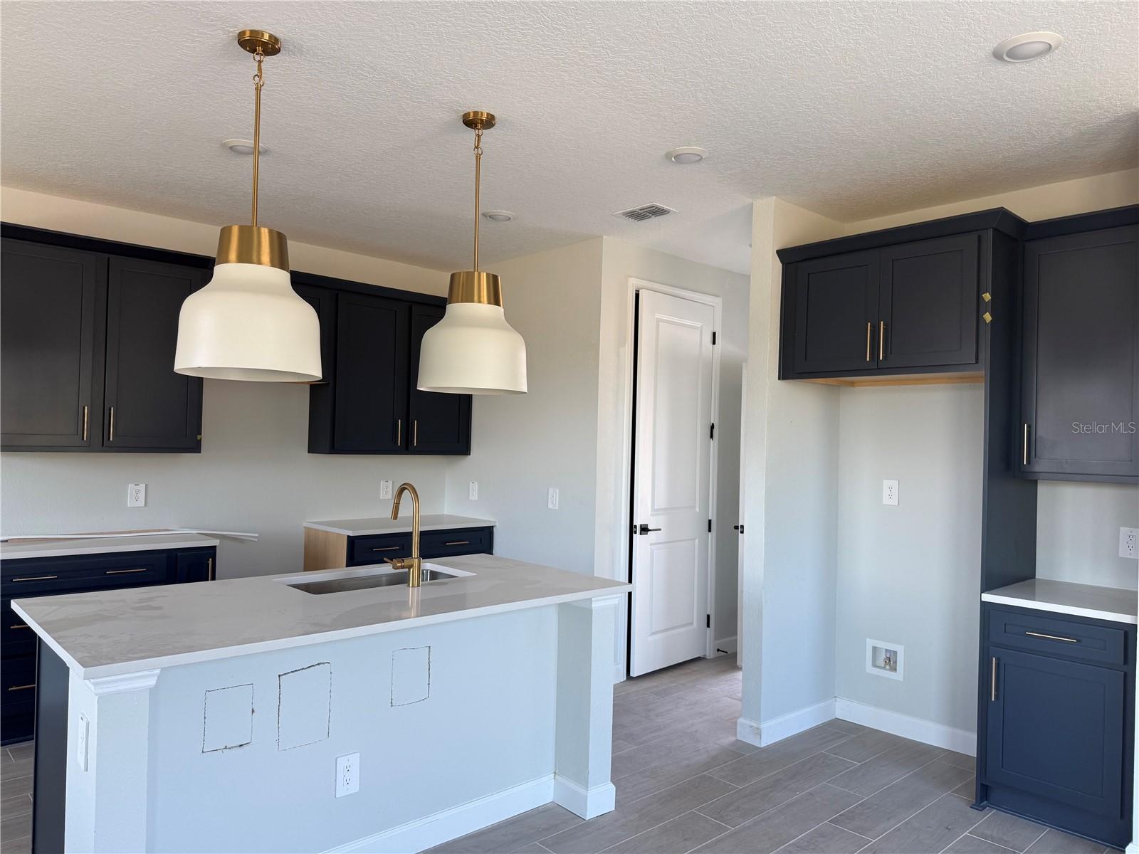 Kitchen featuring AW Sapphire Collection