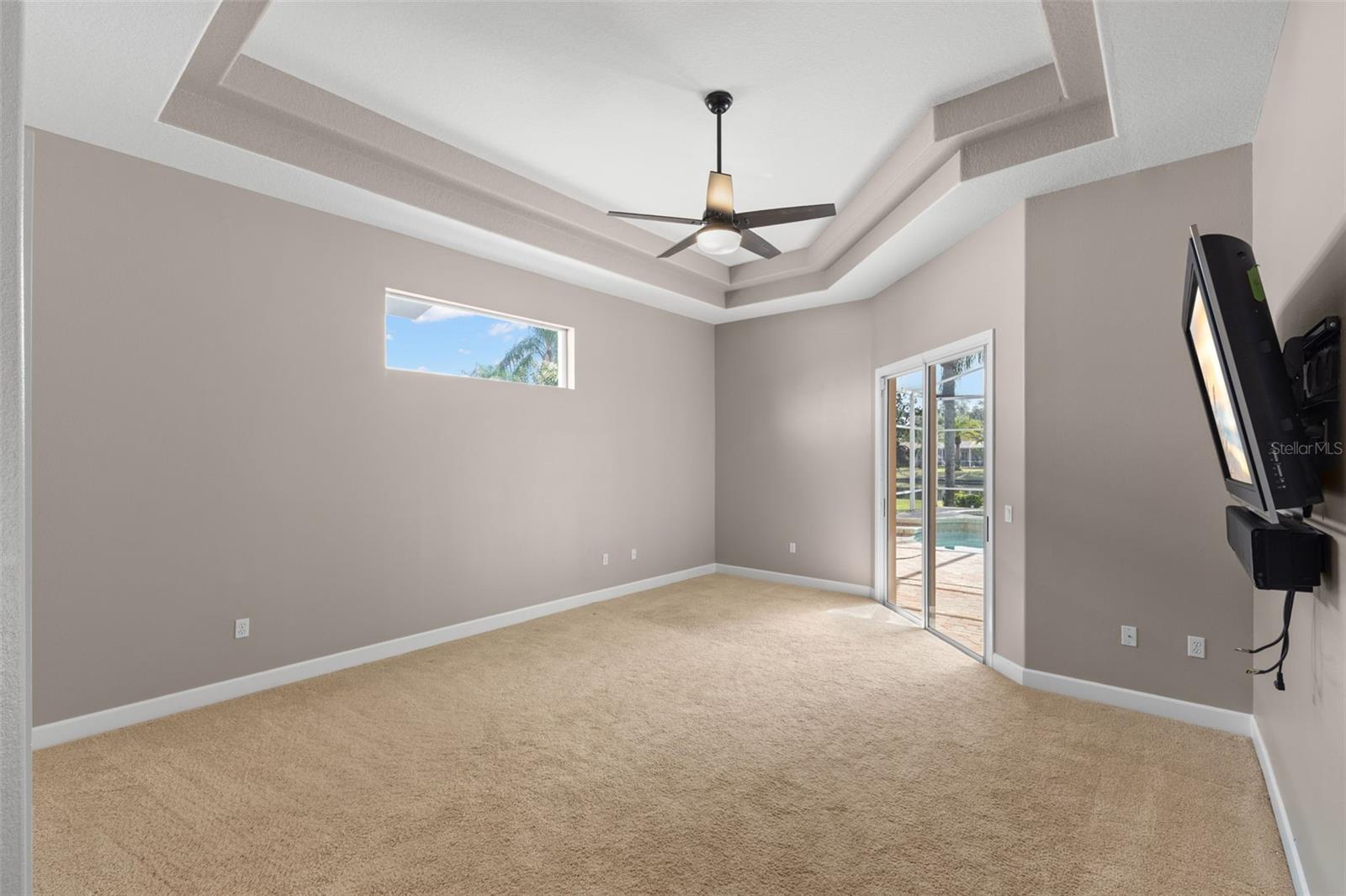 Primary suite with sliding doors to lanai