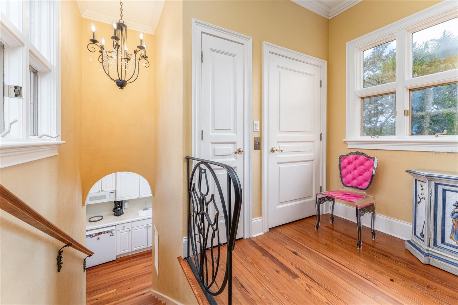 Elevators and kitchenette for split bedroom floor plan