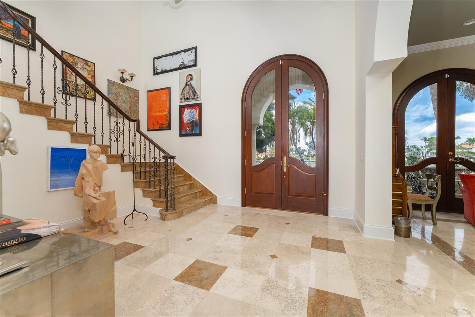 Foyer with 25 foot ceilings