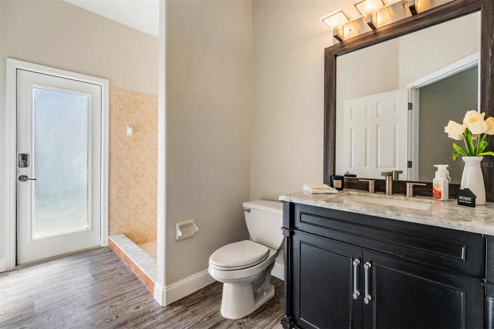 main level full bath/pool bath