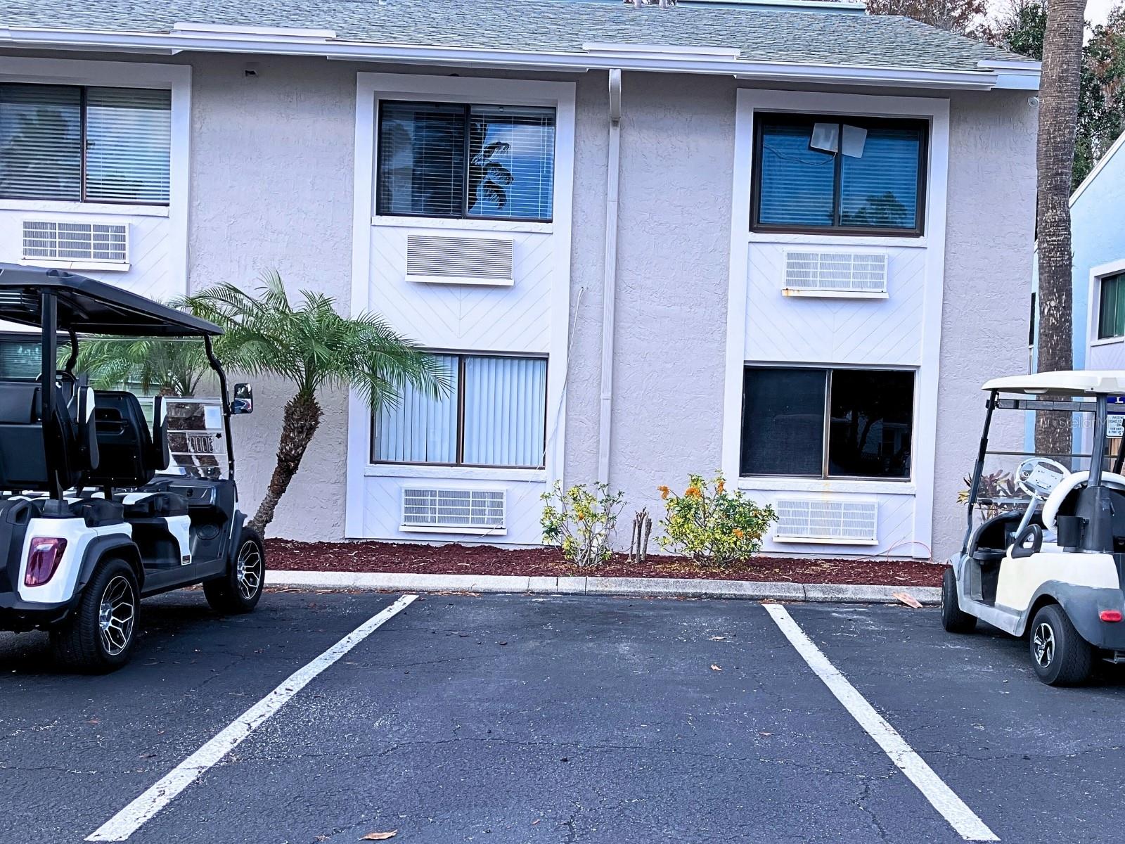 East side of unit near parking