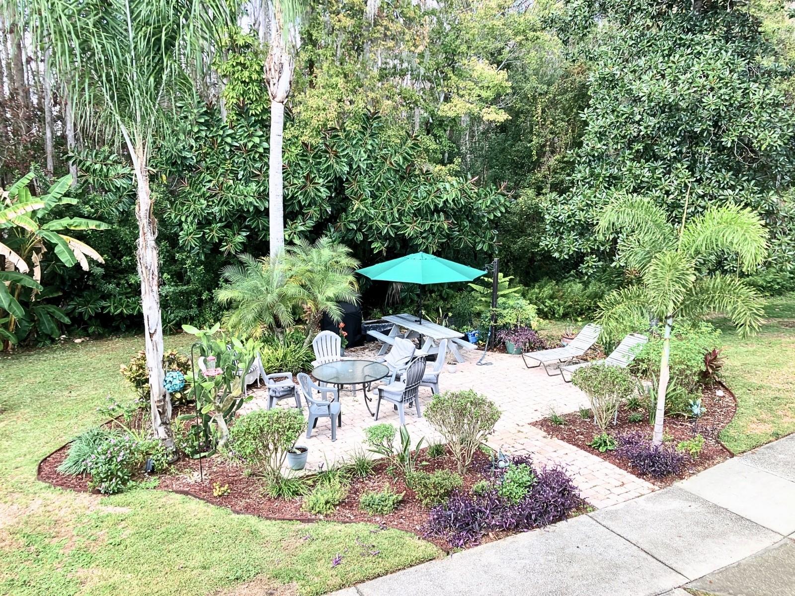 View of the wooded area and sitting area below