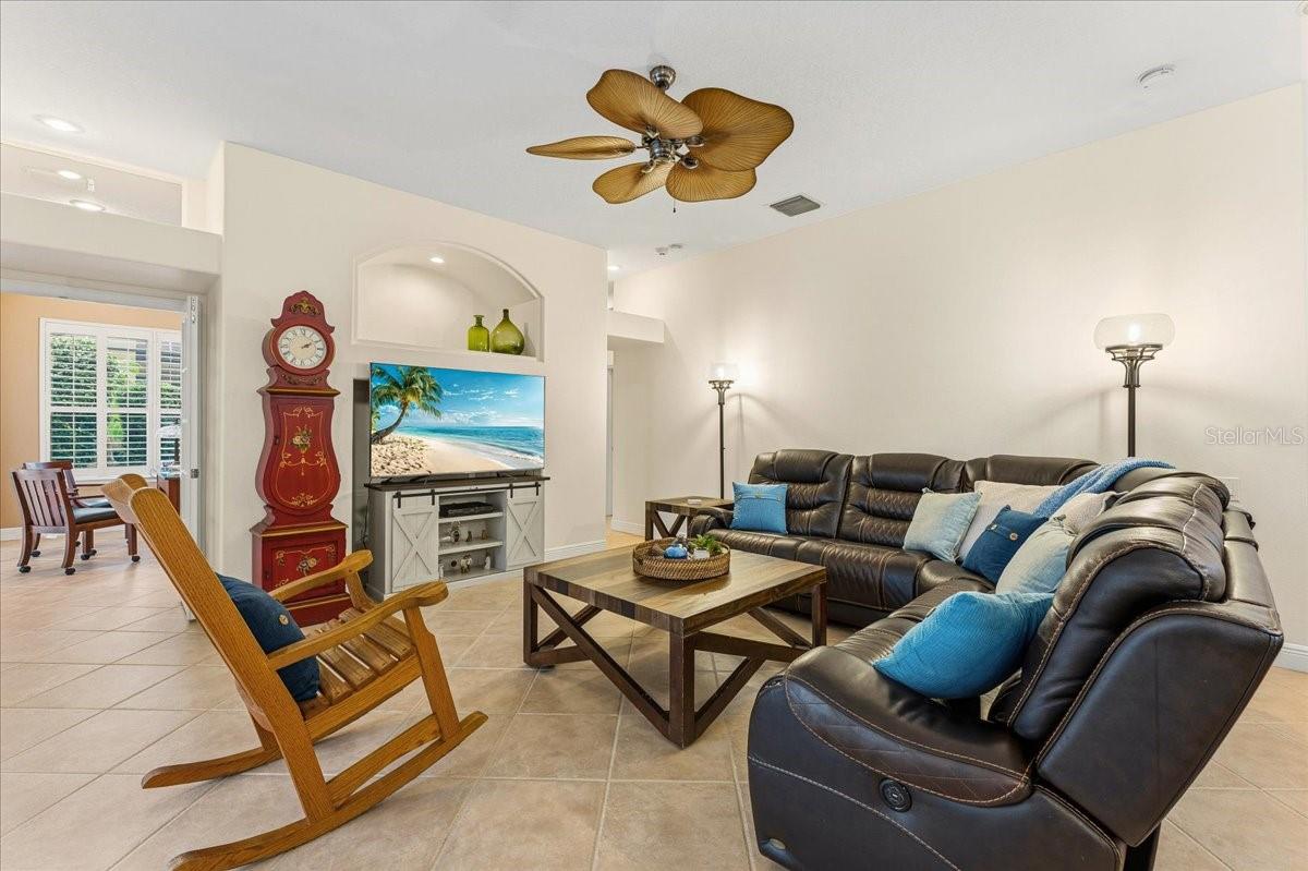 Gather for movie nights just off the kitchen