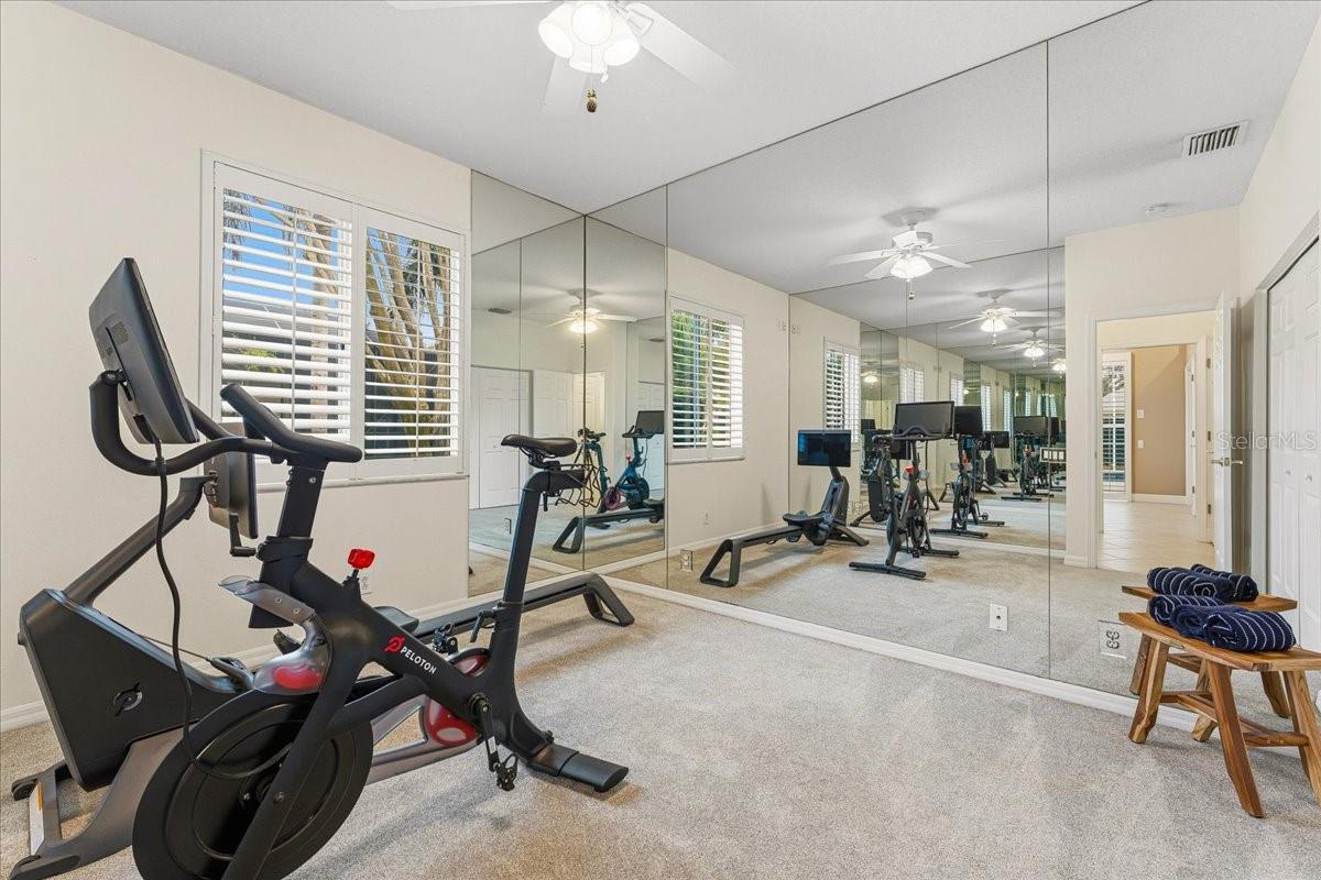 Bedroom #4 currently set up as exercise room