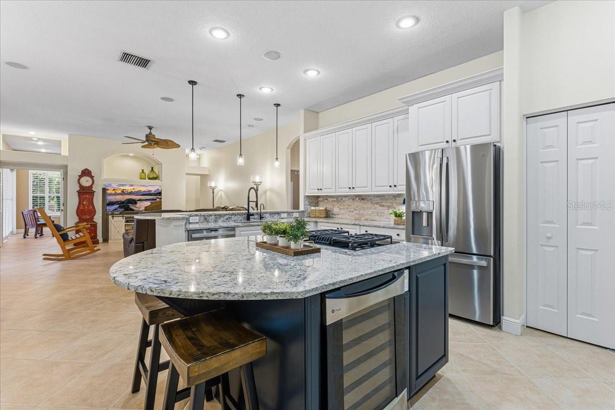 Well-appointed Kitchen with gas range and wine refrigerator