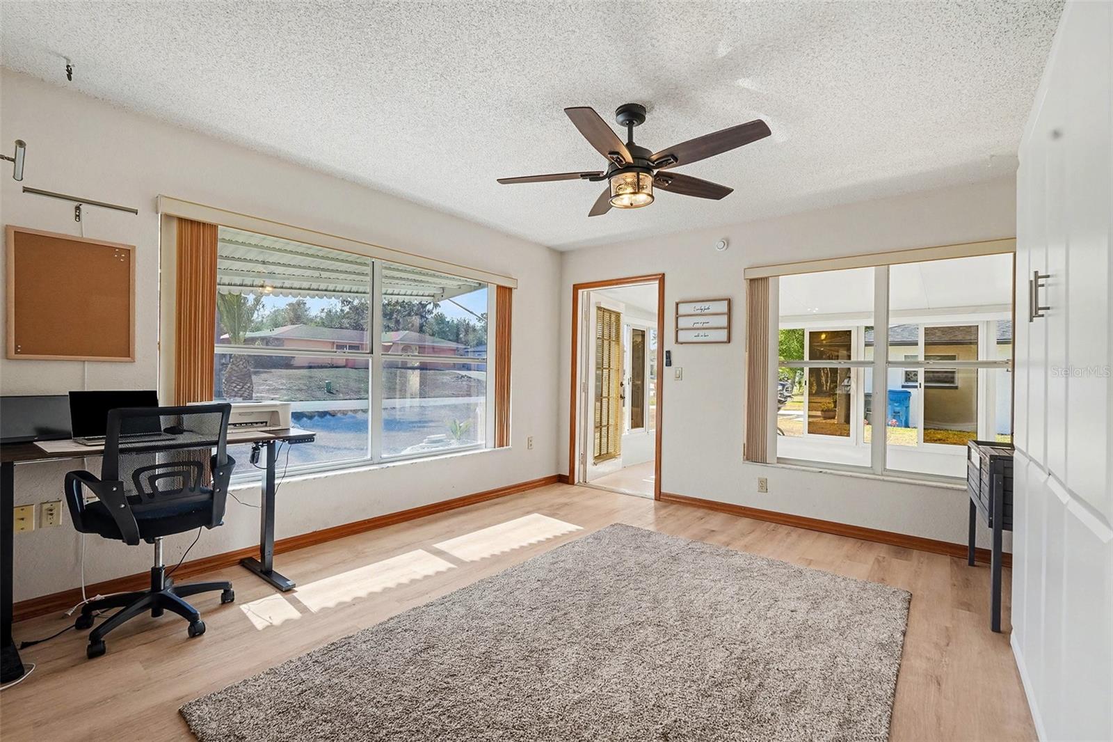 Large den/flex space with murphy bed included