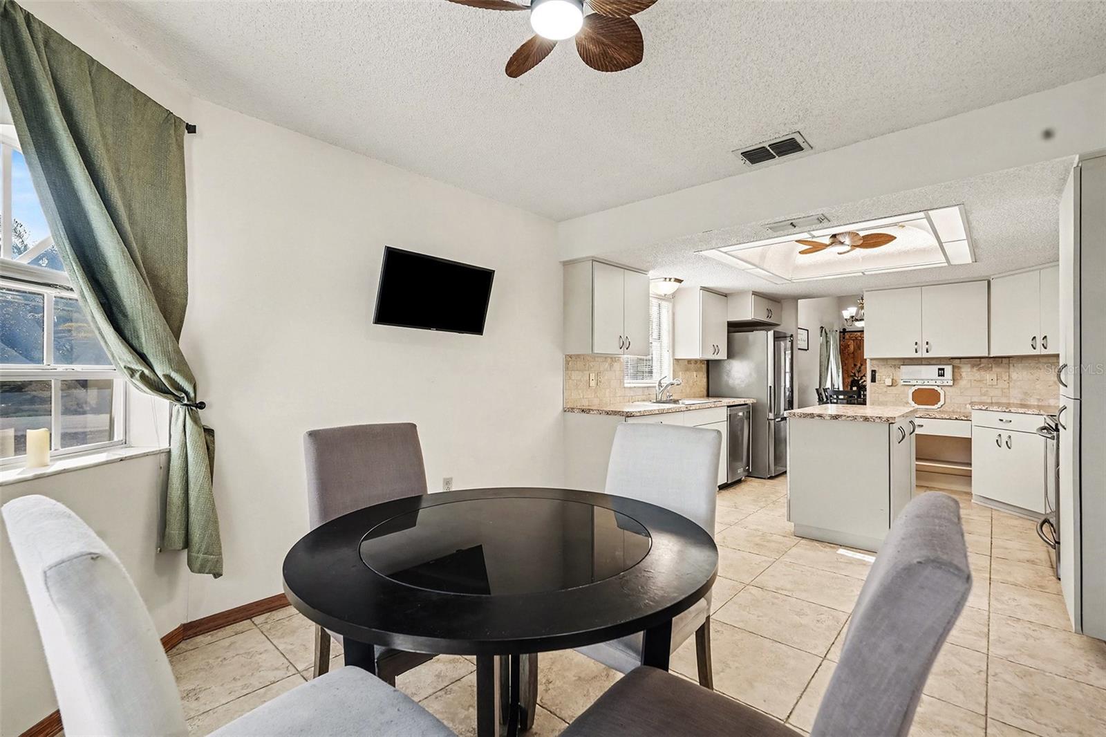 Breakfast nook with view of the kitchen