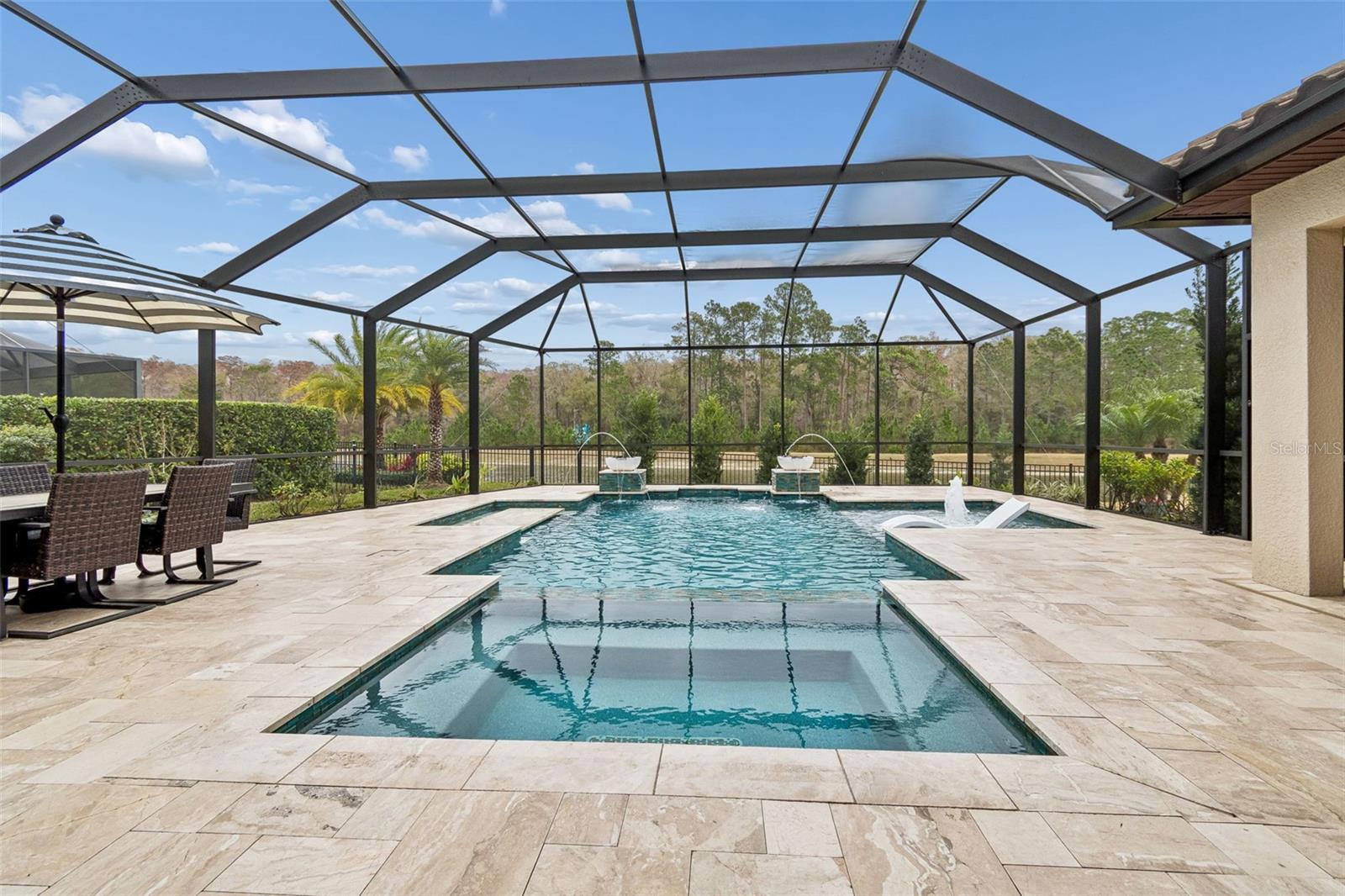 RELAXING VIEWS OF THE POOL WITH BUBBLER, DUAL JETS, WATERFALLS, FIREBOWLS