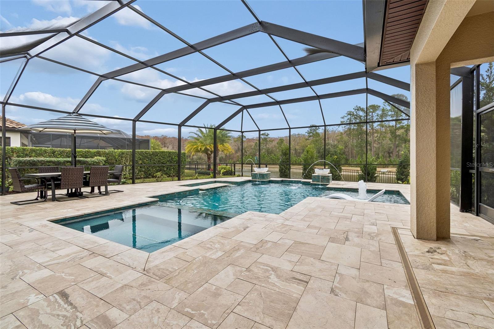 RELAXING VIEWS OF THE POOL WITH BUBBLER, DUAL JETS, WATERFALLS, FIREBOWLS