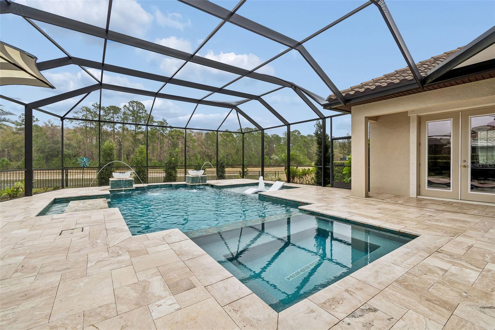RELAXING VIEWS OF THE POOL WITH BUBBLER, DUAL JETS, WATERFALLS, FIREBOWLS