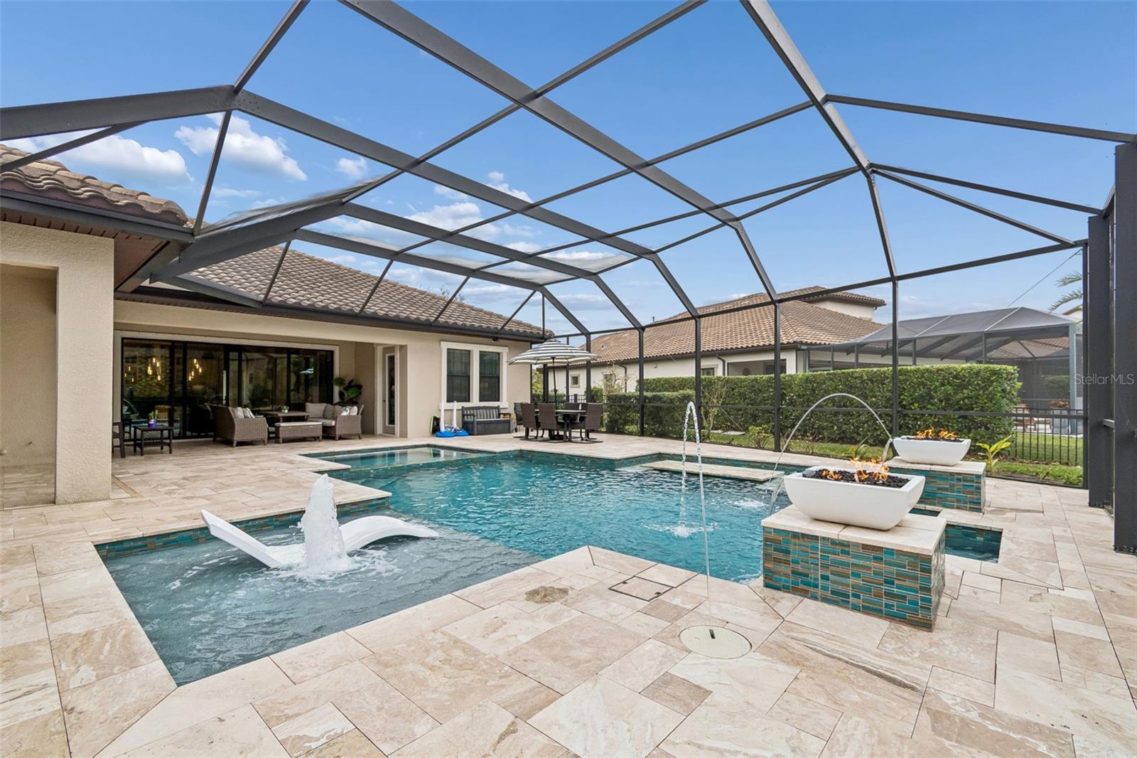 RELAXING VIEWS OF THE POOL WITH BUBBLER, DUAL JETS, WATERFALLS, FIREBOWLS