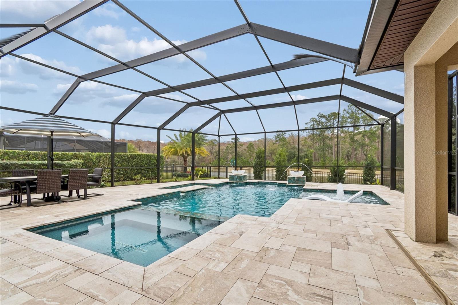 RELAXING VIEWS OF THE POOL WITH BUBBLER, DUAL JETS, WATERFALLS, FIREBOWLS