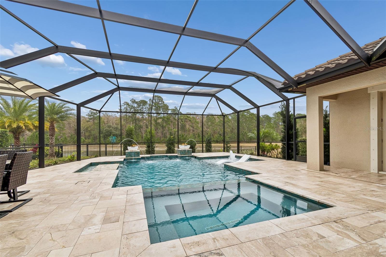 RELAXING VIEWS OF THE POOL WITH BUBBLER, DUAL JETS, WATERFALLS, FIREBOWLS