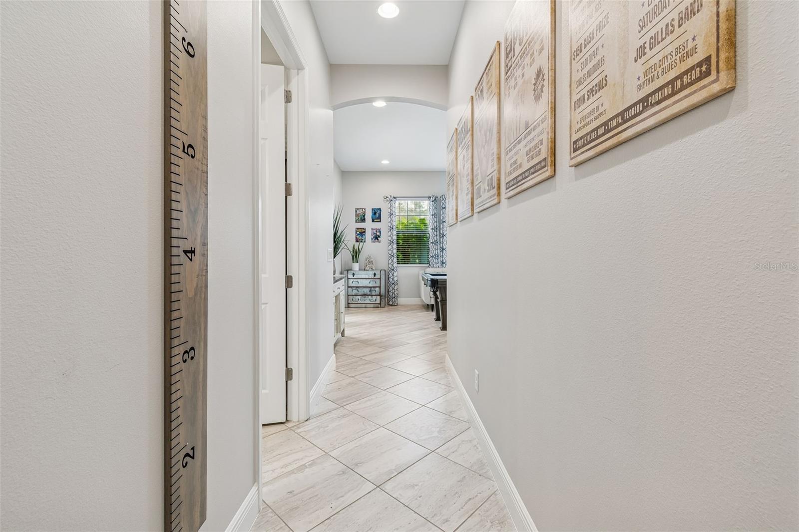 HALLWAY TO DOWNSTAIRS BONUS ROOM OFF OF POOL/LANAI