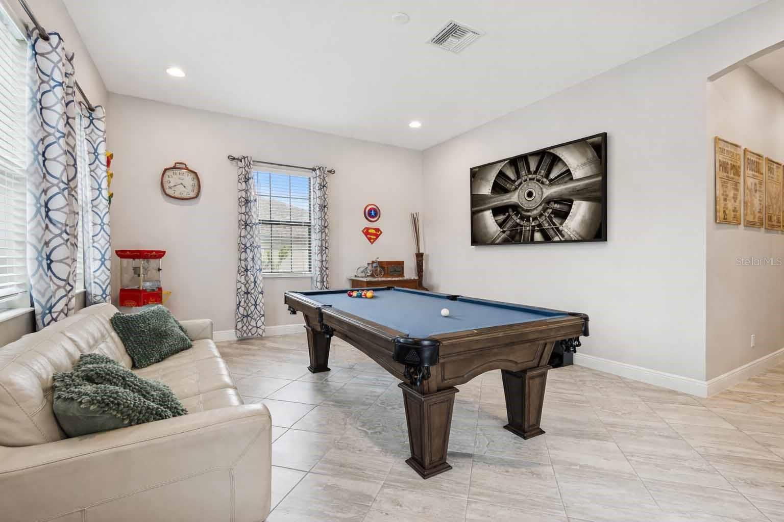 DOWNSTAIRS BONUS ROOM OFF OF POOL/LANAI