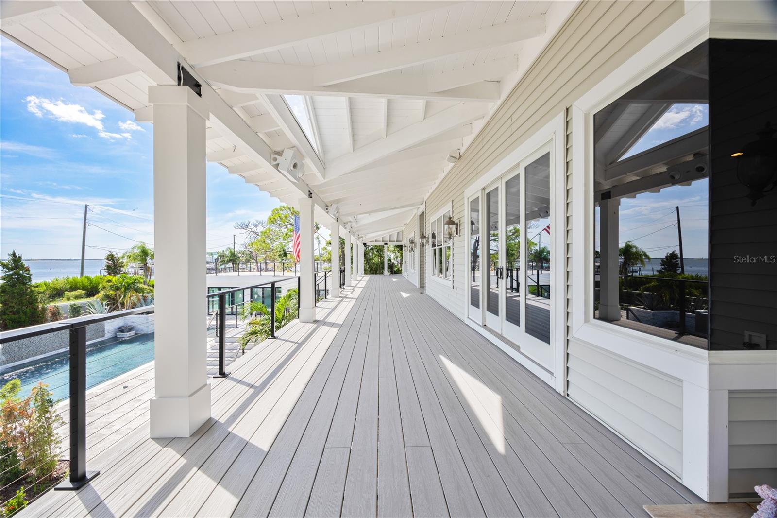Spacious elevated patio deck providing abundant outdoor living space with scenic views.
