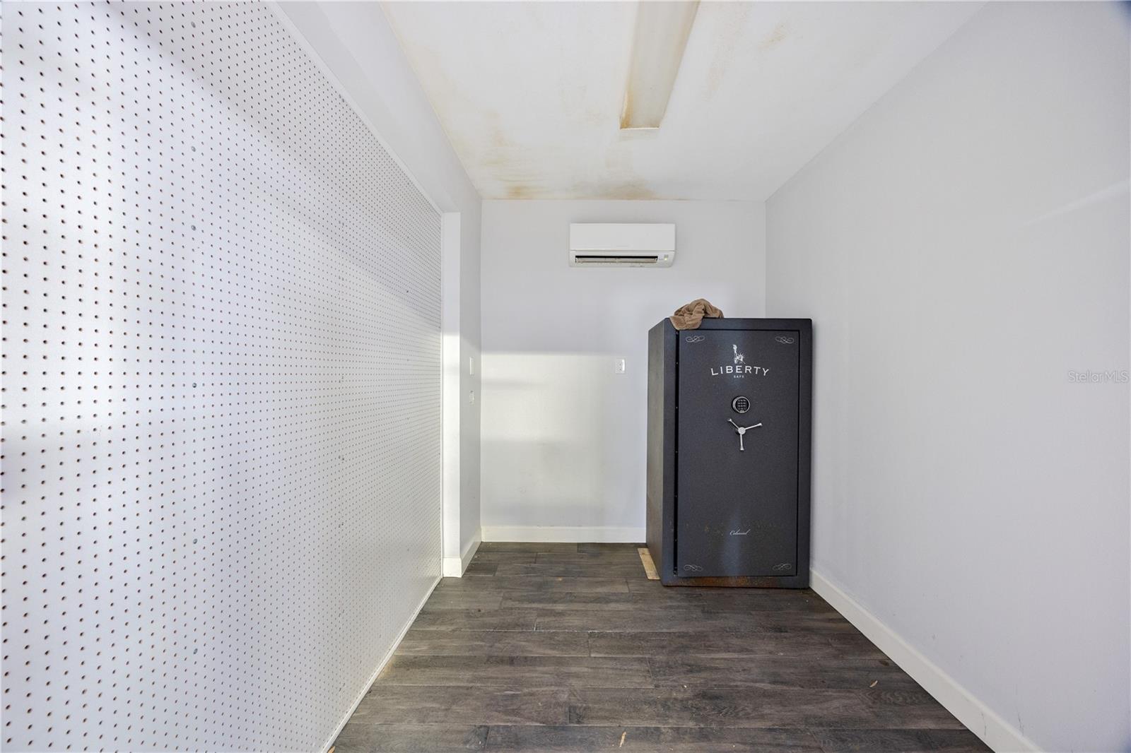 Additional climate controlled storage room in the garage, perfect for tools, gear or secure items.