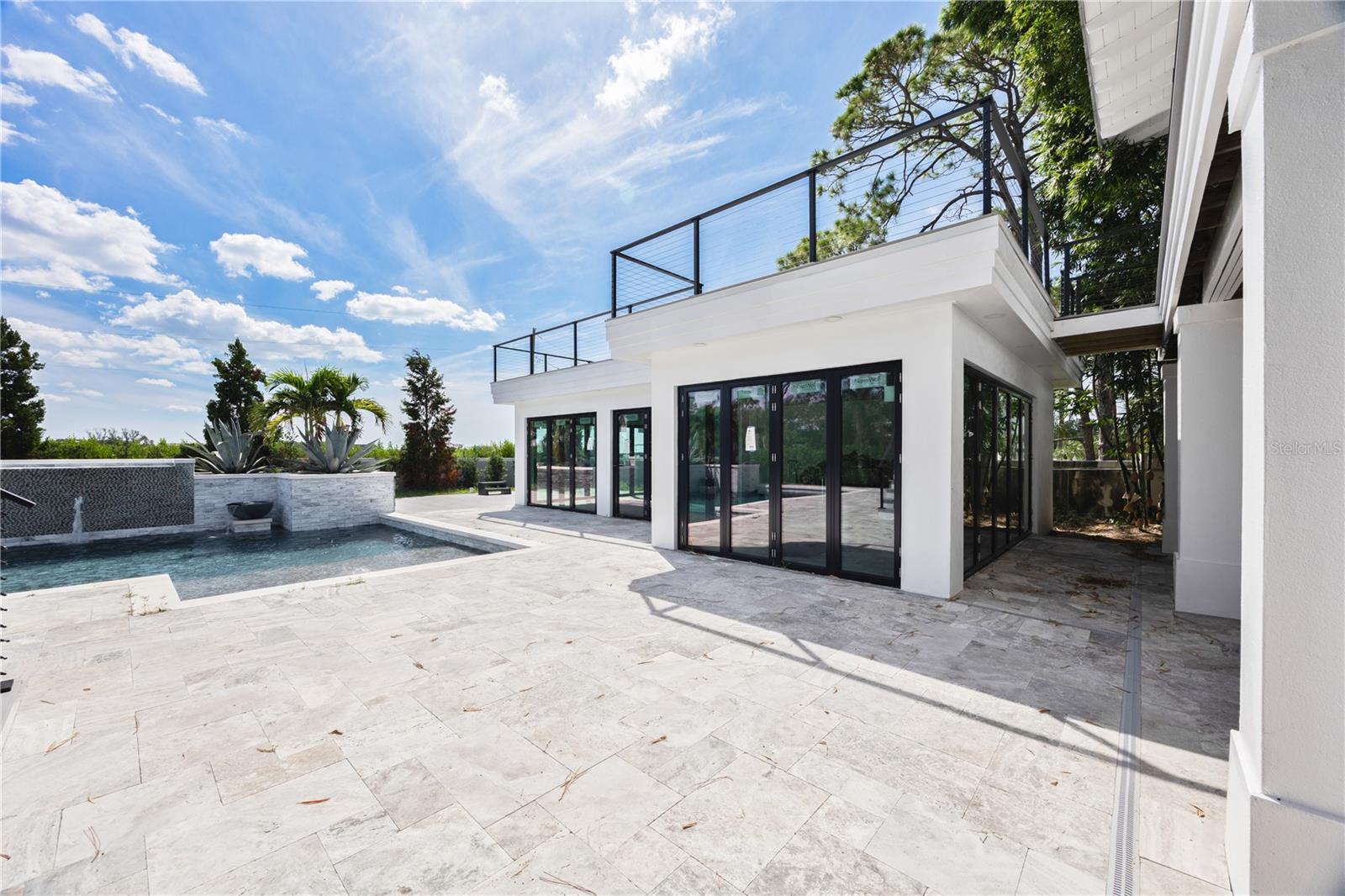 Outdoor sitting area perfect for upscale indoor-outdoor entertaining.