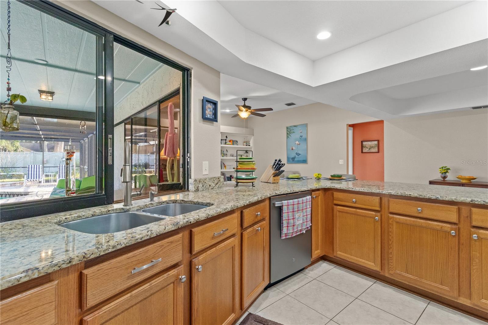 Pass-through window in the kitchen which is perfect for indoor/outdoor entertaining.