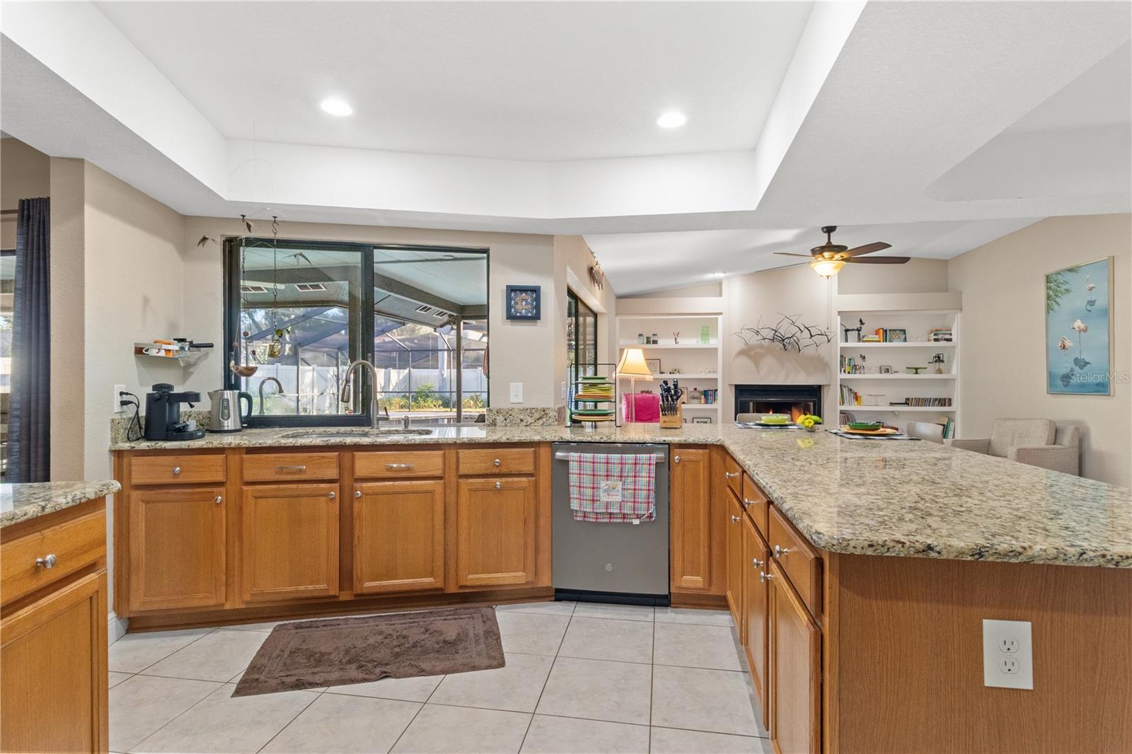 Plenty granite of counter tops in the kitchen, which opens to the family room