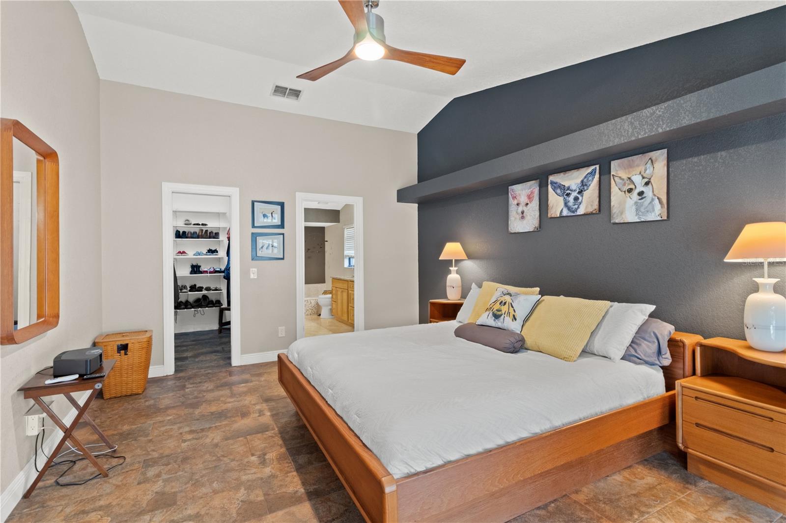 Primary suite with huge walk in closet, and high ceilings