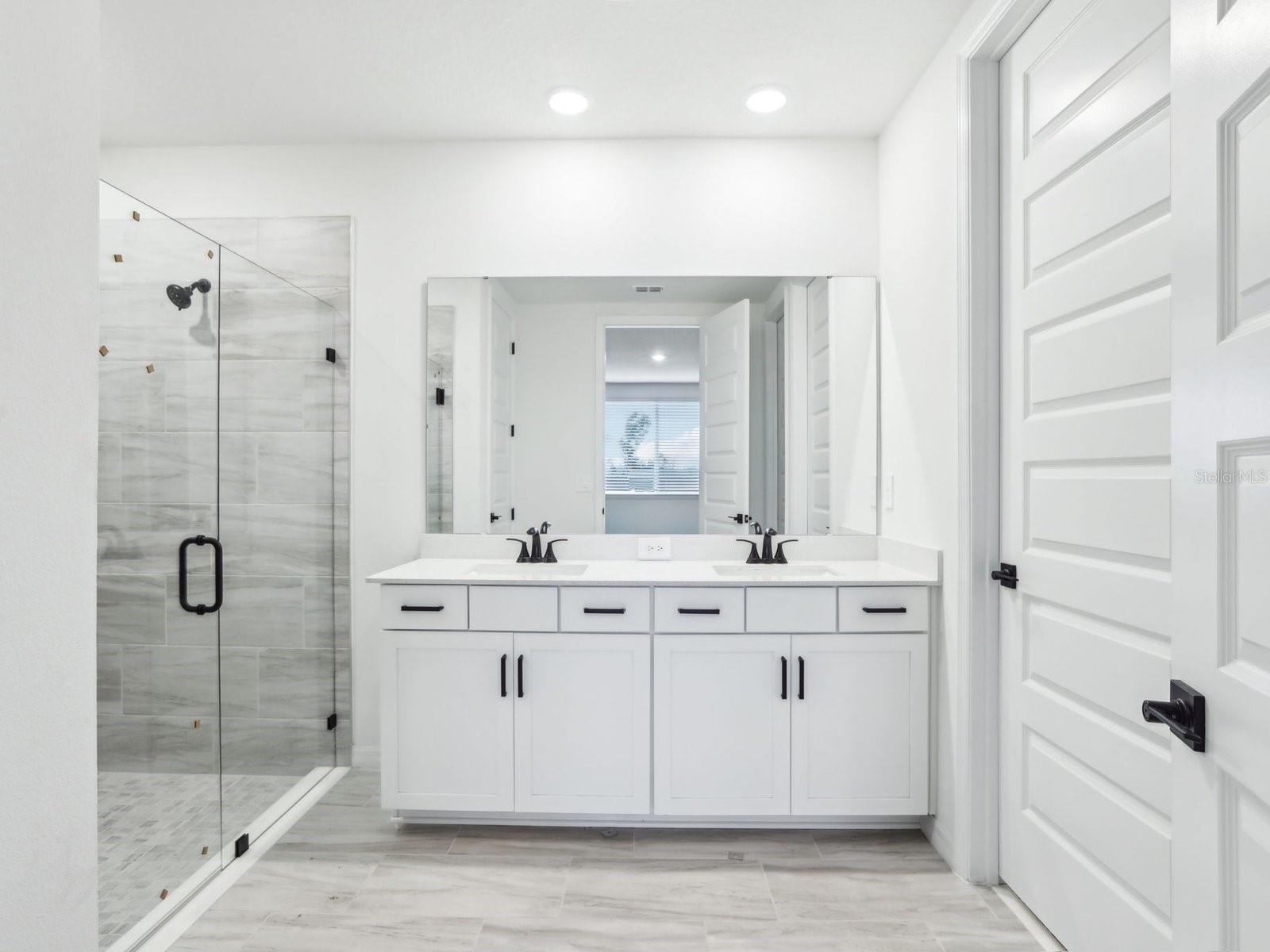 Interior photos are not of the actual home but are photos of the builder home with the same floorplan with similar interior finishes and features.