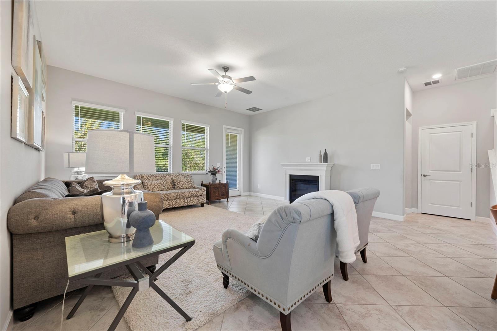 1st floor primary bedroom is located off the living room