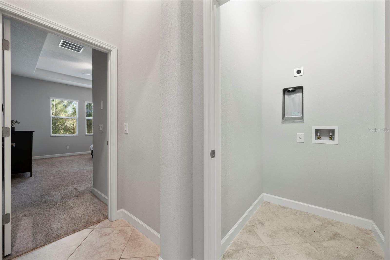 Downstairs laundry (there is a laundry room upstairs too!)