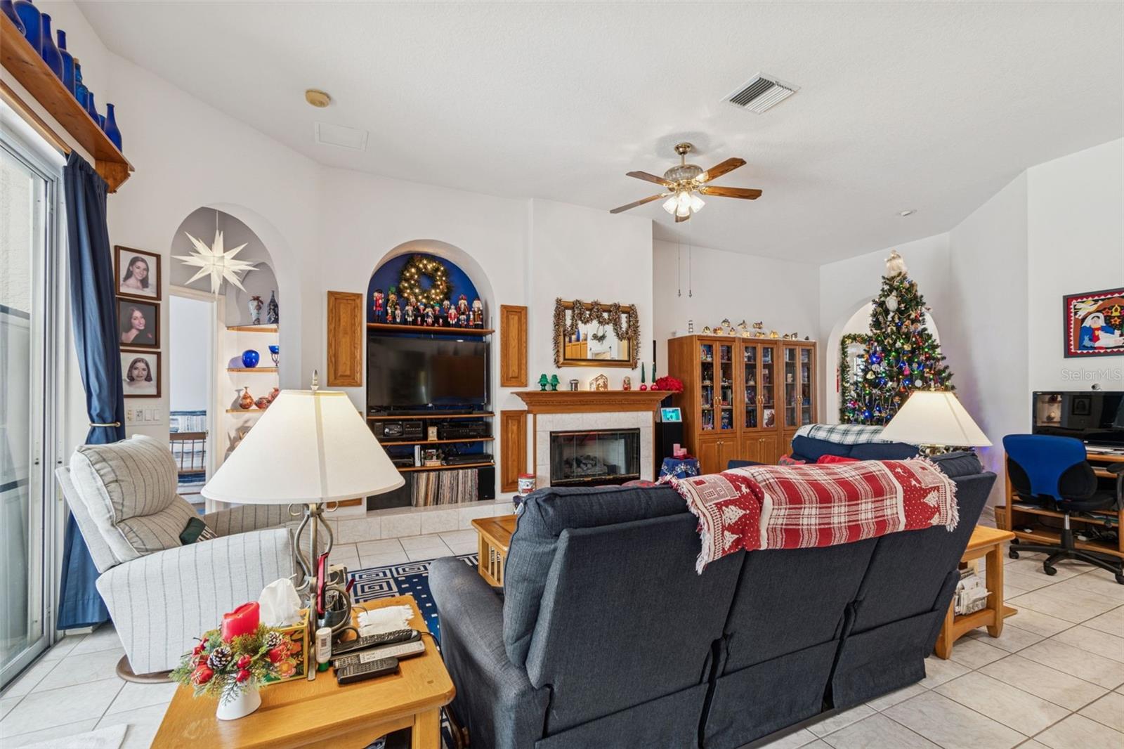 Family Room with Fireplace that is Gas and Wood Burning