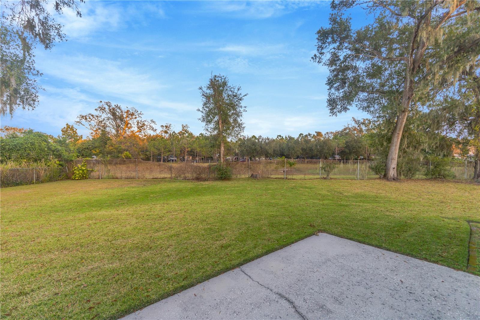 Oversized lot & No backyard neighbors!