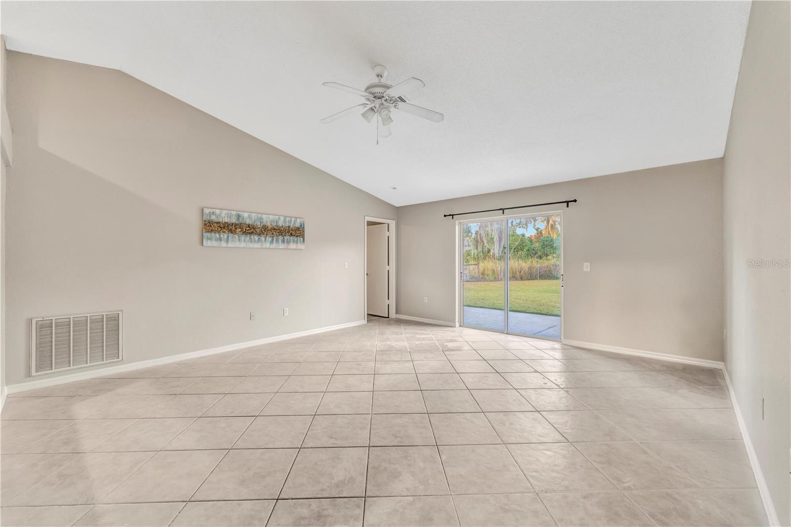 Enjoy the wide open floor plan w/ high ceilings