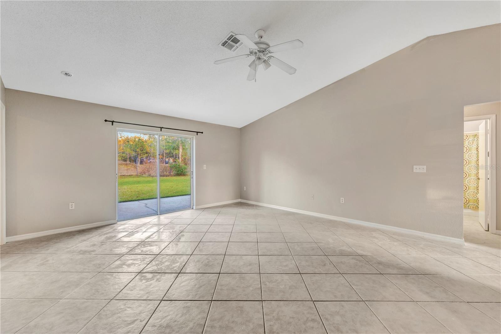 Enjoy the wide open floor plan w/ high ceilings