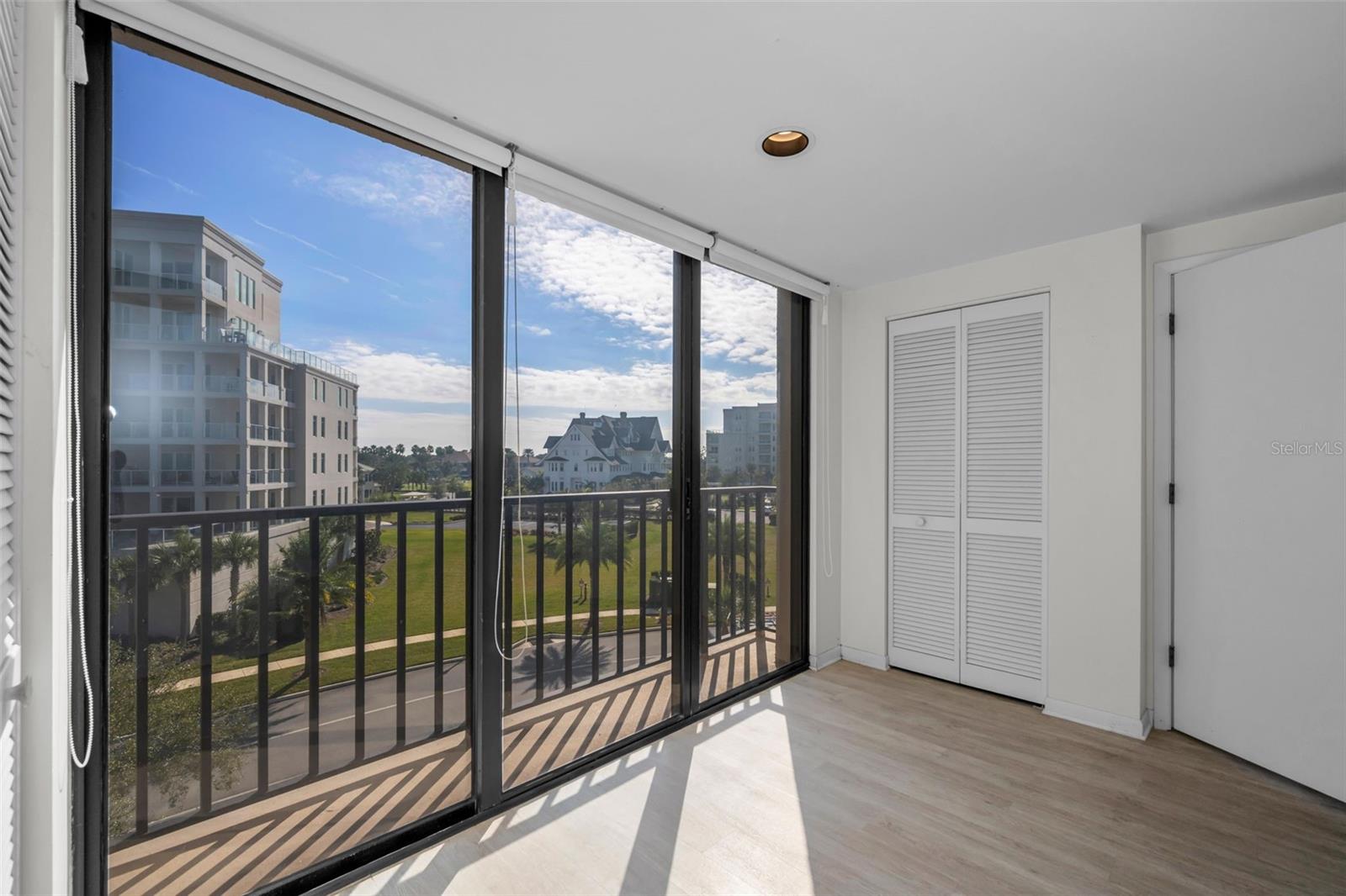 Kithen slider looks to the east and the Belleview Inn and Country Club. Pantry to the right. Room for a cafe table and 2 chairs.