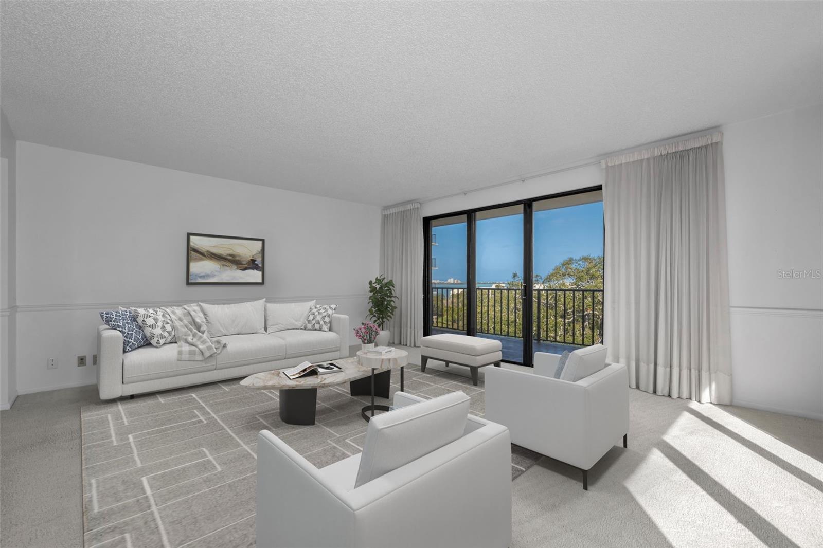 The living room has a northwest and east view of the intercoastal on one side and the sunrise on the other!