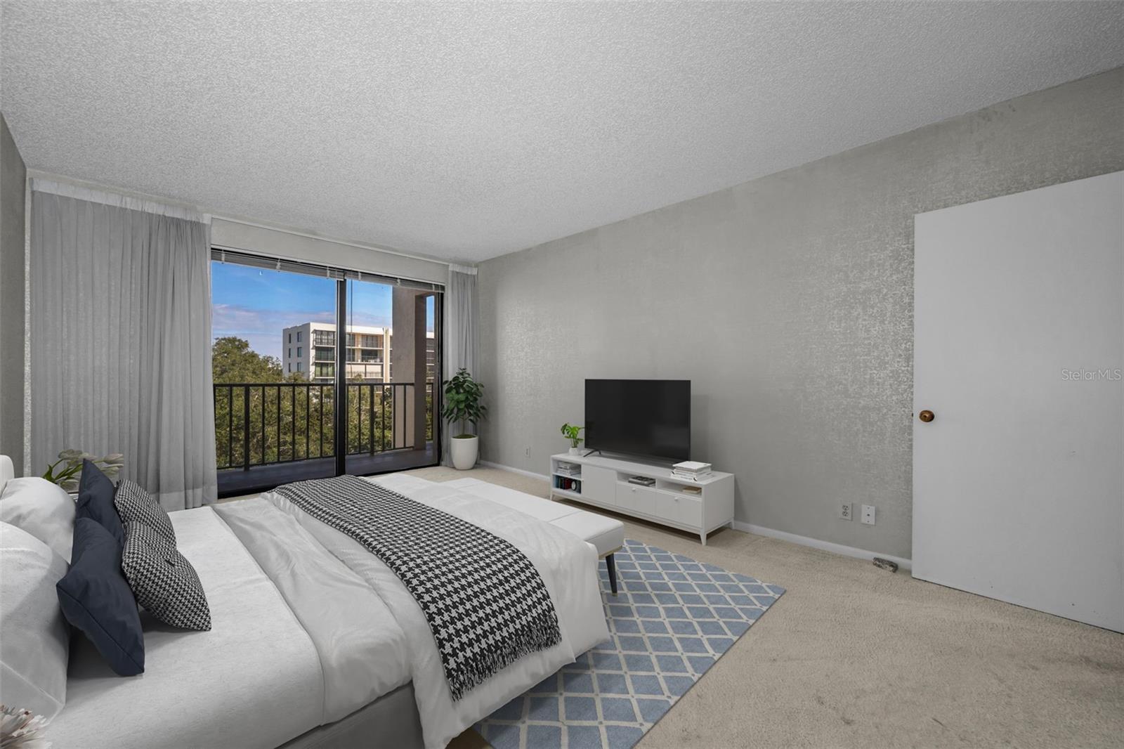 The huge master suite has access to the 35' balcony