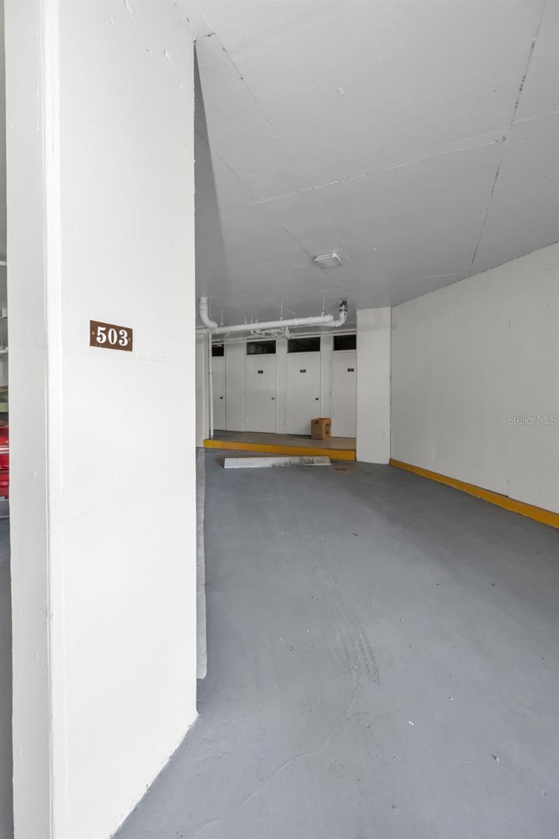 Under building parking. So convenient to the lobby and staircase.