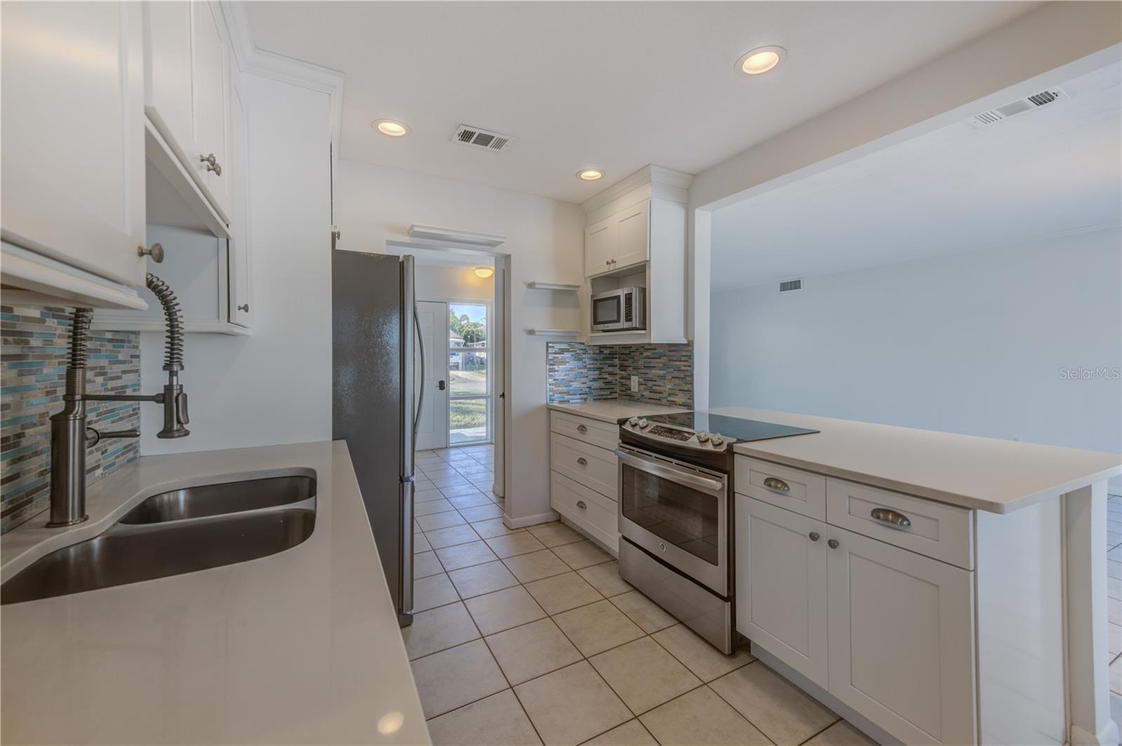 PLENTY OF COUNTER SPACE TO PREPARE MEALS