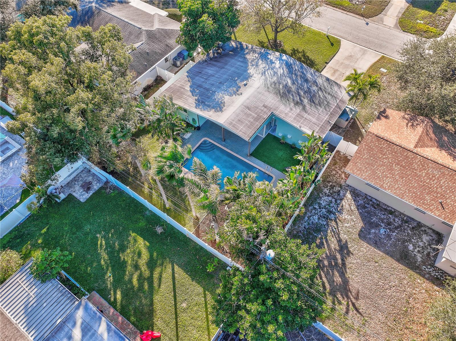 SPACIOUS BACKYARD WITH VINYL PRIVACY FENCE SURROUNDING
