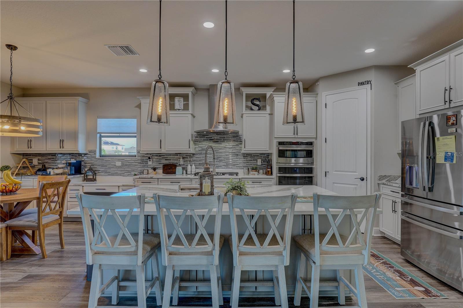 Beautiful chefs kitchen, with tons of counter space and storage.